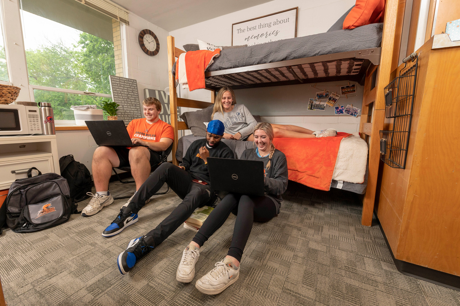 Undergraduate students studying in a residence hall.