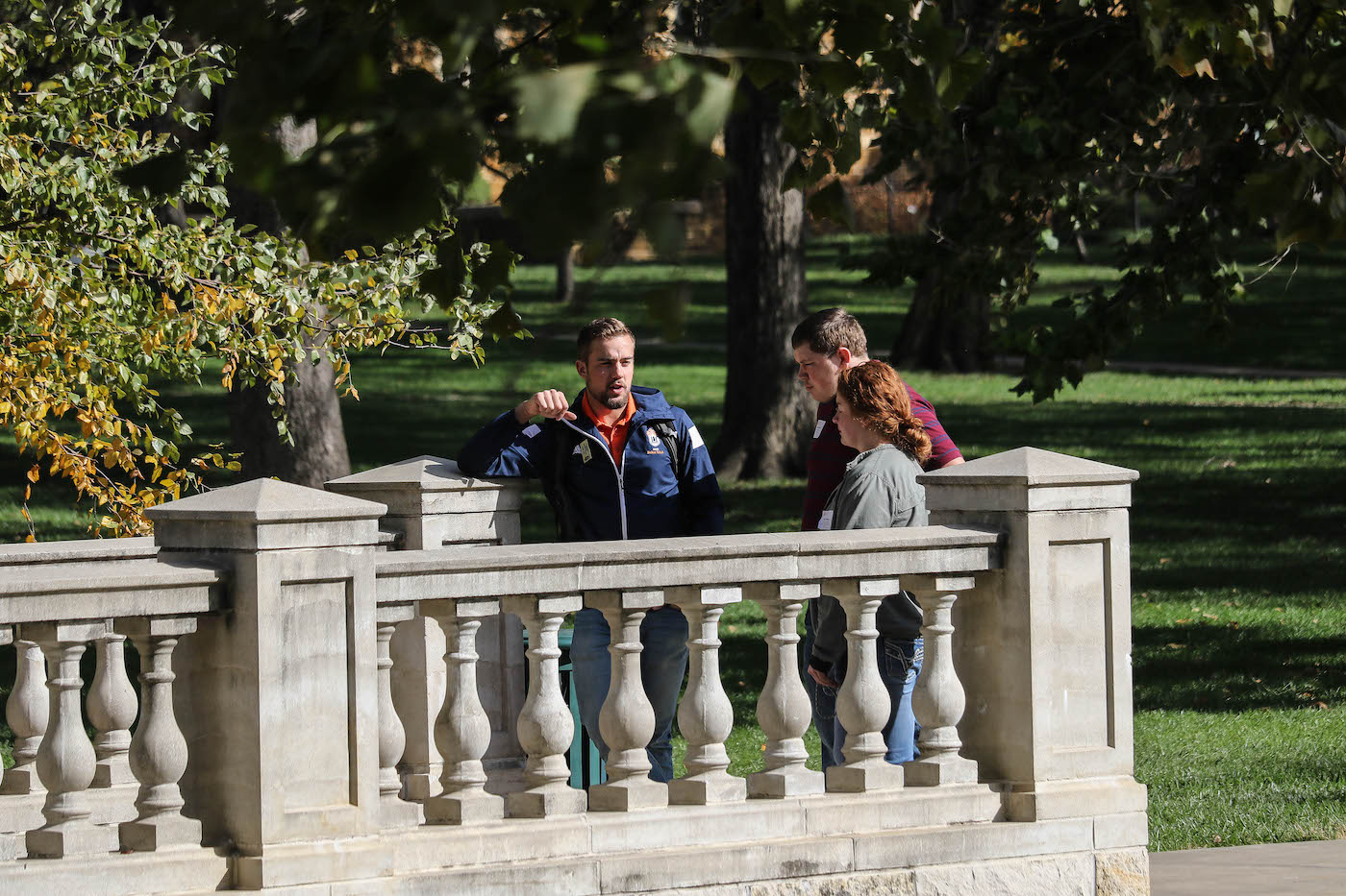 Baker University Admissions assistant Jack Mills giving a tour of campus to prospective students