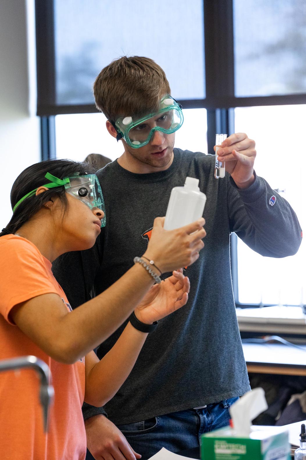 Two science students working in lab