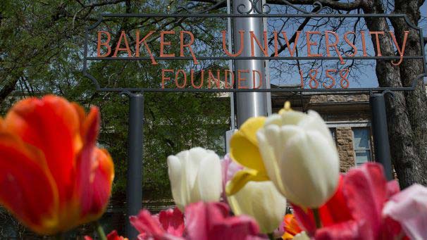 Baker University sign with tulip flowers