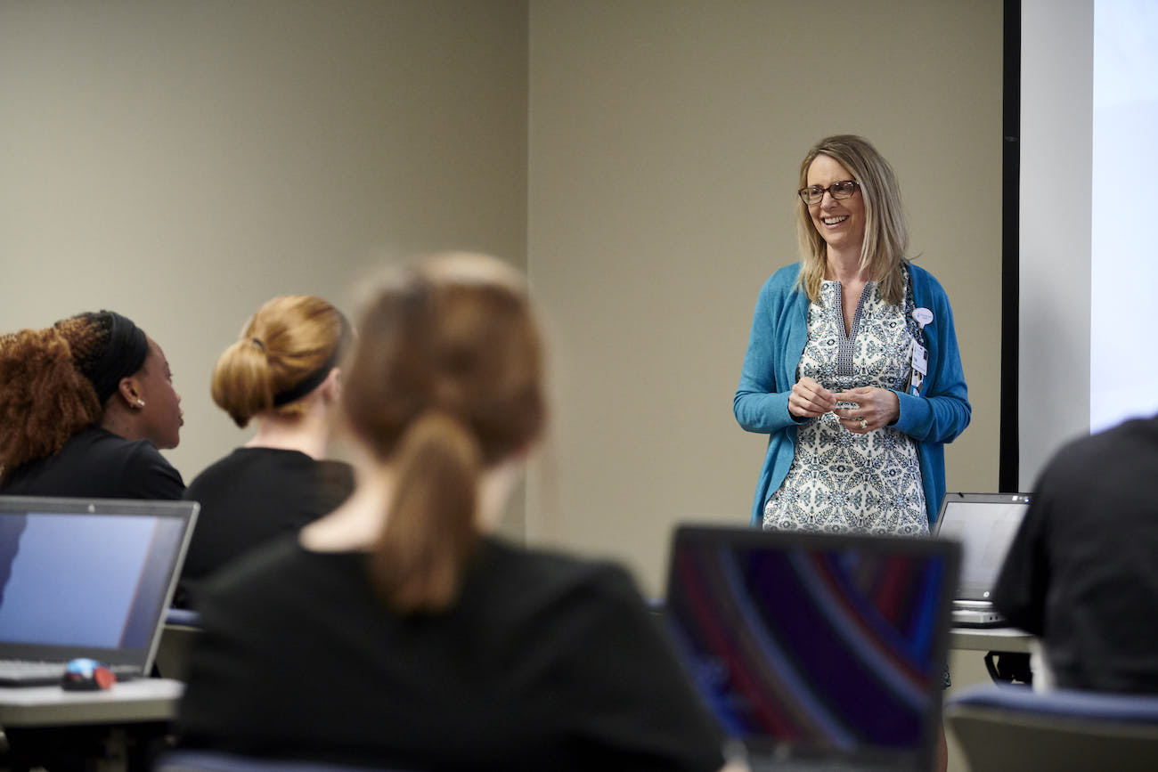 School of nursing professor giving lecture