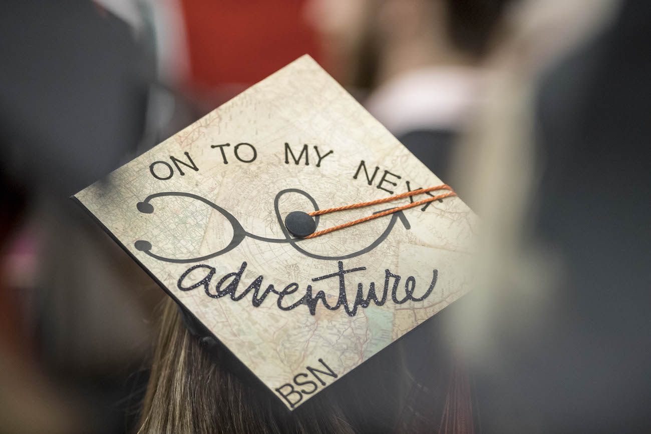Graduation cap that says "on to my next adventure"