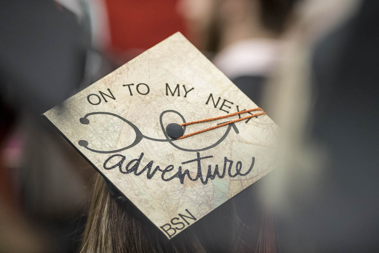 Graduation cap that says "on to my next adventure"
