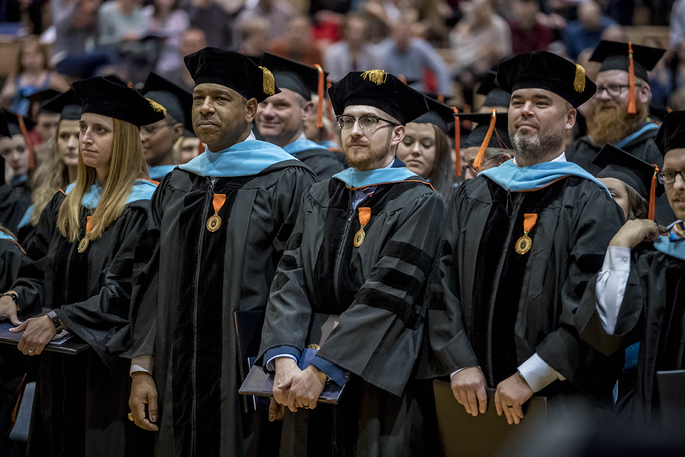 Doctoral graduates at commencement