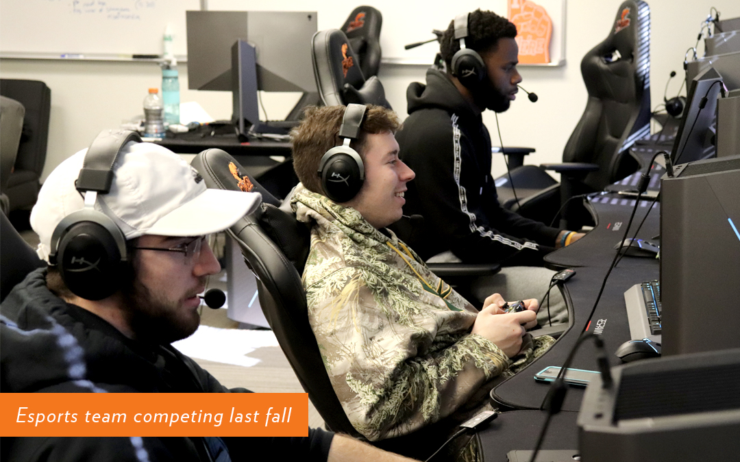 Three male students competing in an Esports tournament in fall 2020