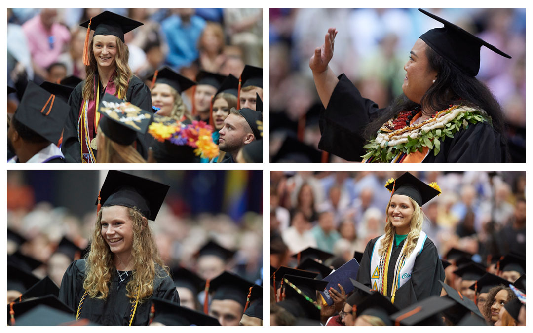 four outstanding seniors standing at commencement ceremony