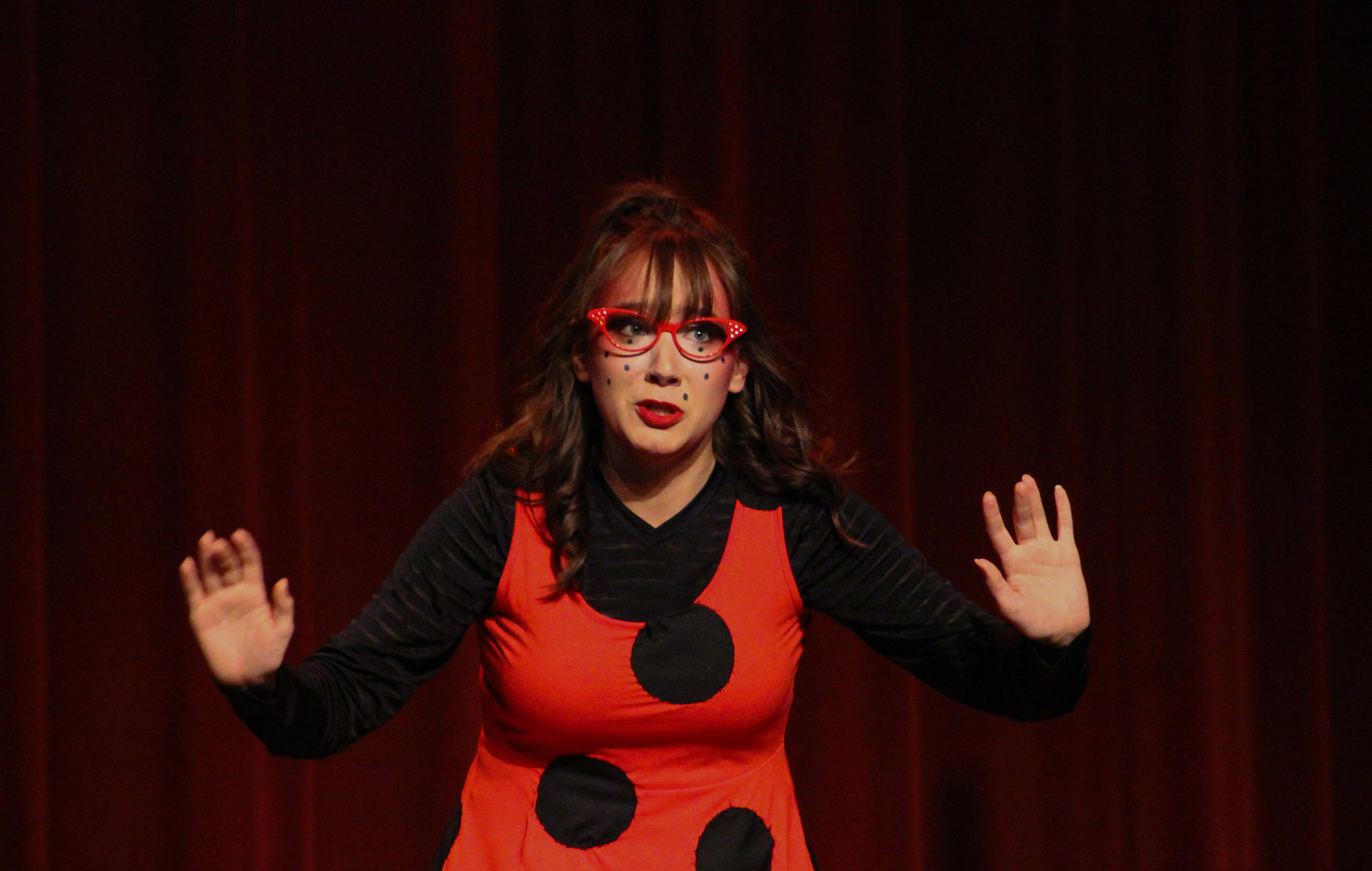 Student actress playing the role of Ladybug during the theater performance of James and the Giant Peach