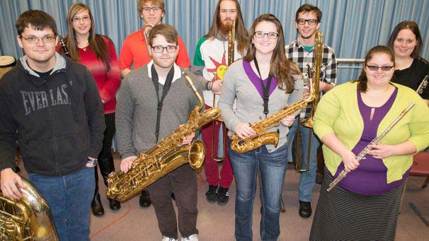 Band members holding instruments