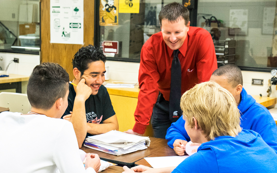 Dr. Britton Hart, Kansas Principal of the Year talking with students