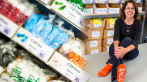 Laura Schmidt poses in her warehouse.