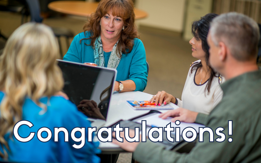 graphic with students at a table talking with text that says Congratulations