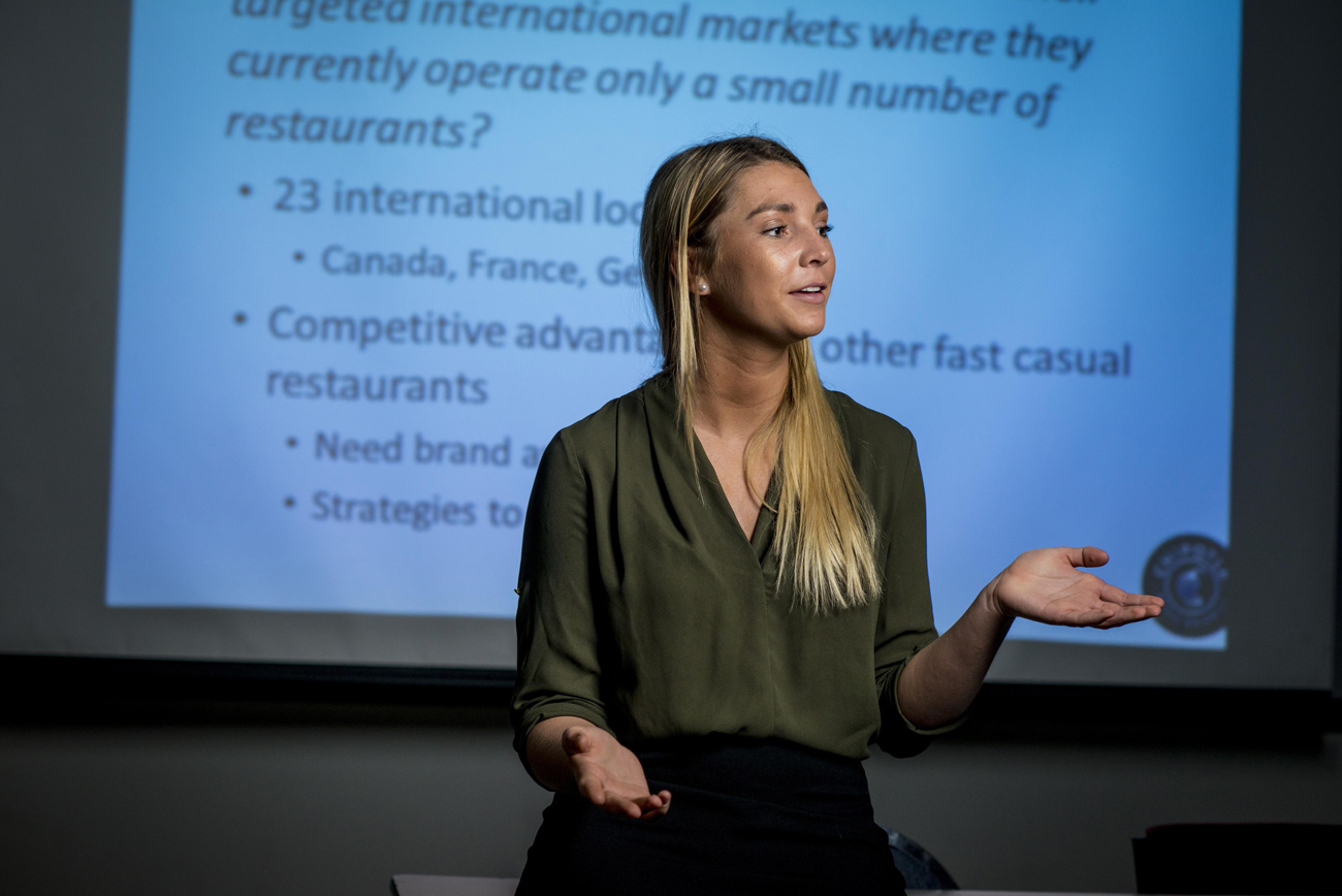 Female business student giving a presentation