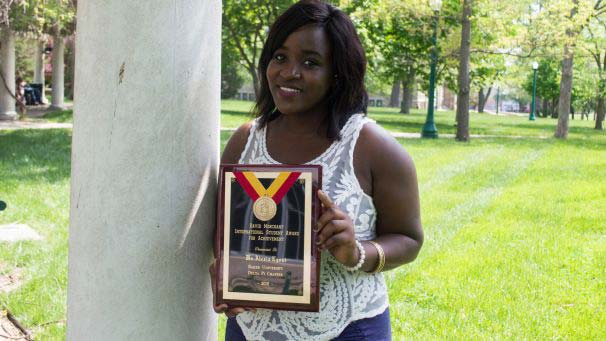 Alexia Nyoni holding International Student Award for Achievement