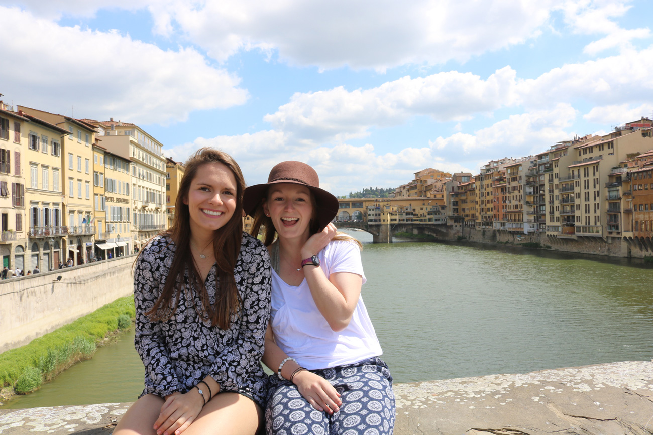 Students smiling for a photo during a study abroad program trip