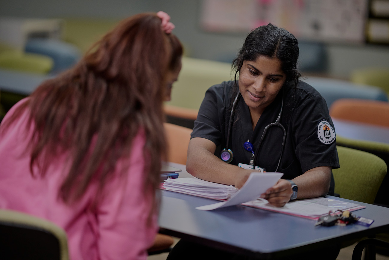 Nursing student studying with a friend.