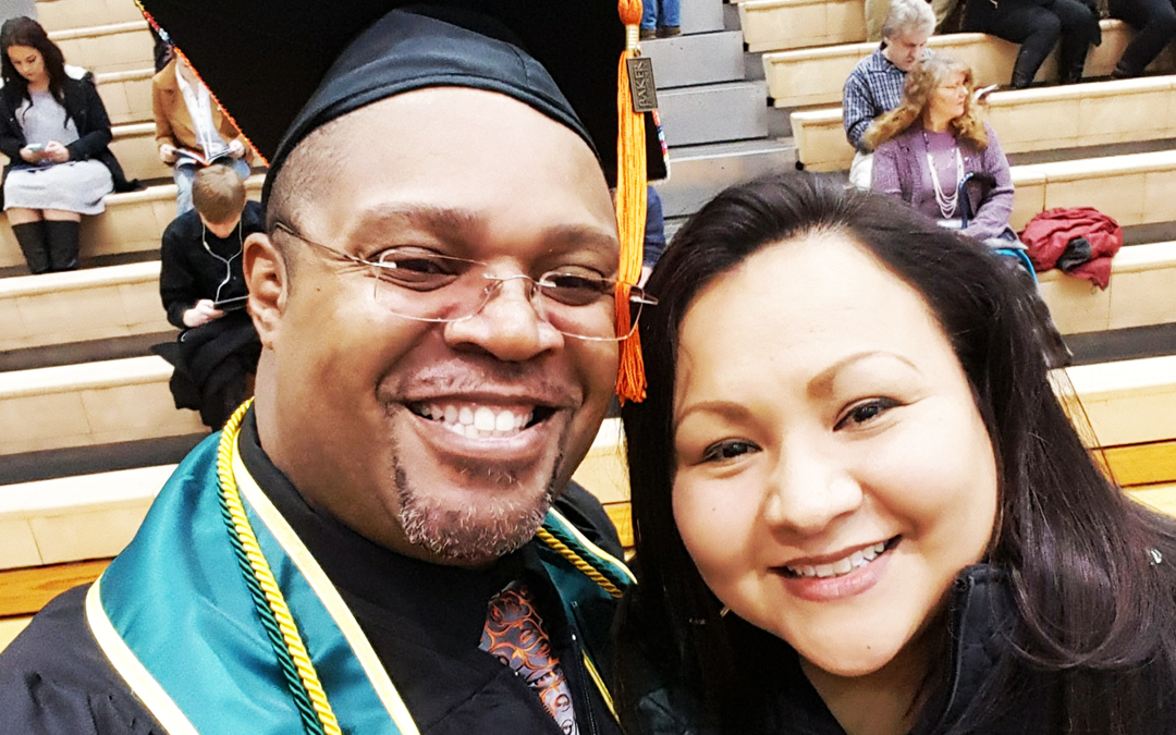 Selfie of Mona and Lenard Franklin at graduation ceremony