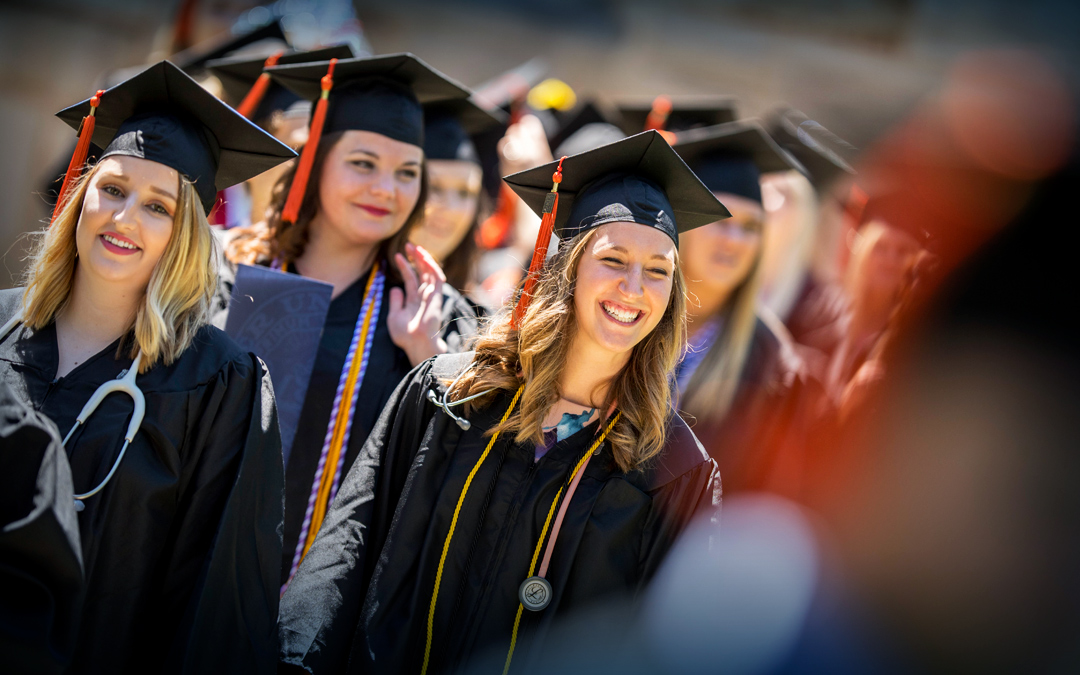 Nursing graduates marching at commencement