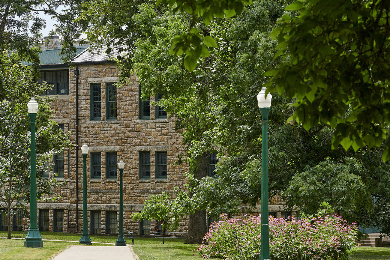 Beauty Shot of Mabee Hall with lamp posts