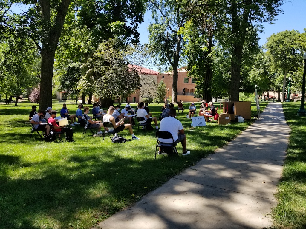 Picture of introduction to business class enjoying class outside on the first day