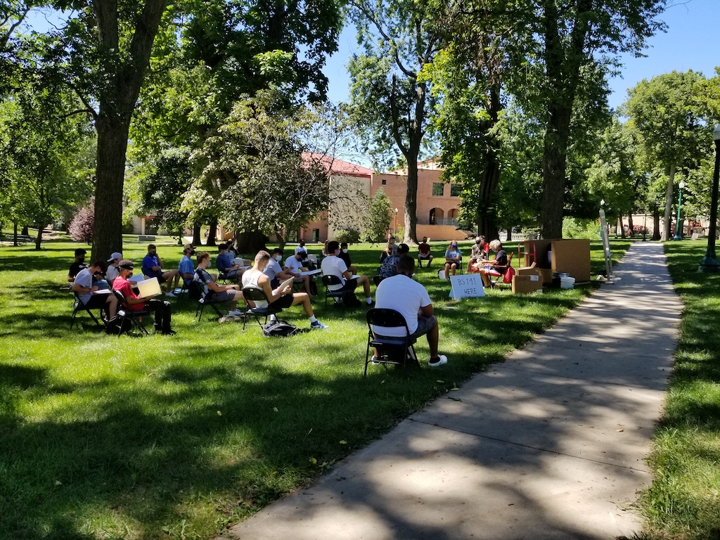 Picture of introduction to business class enjoying class outside on the first day