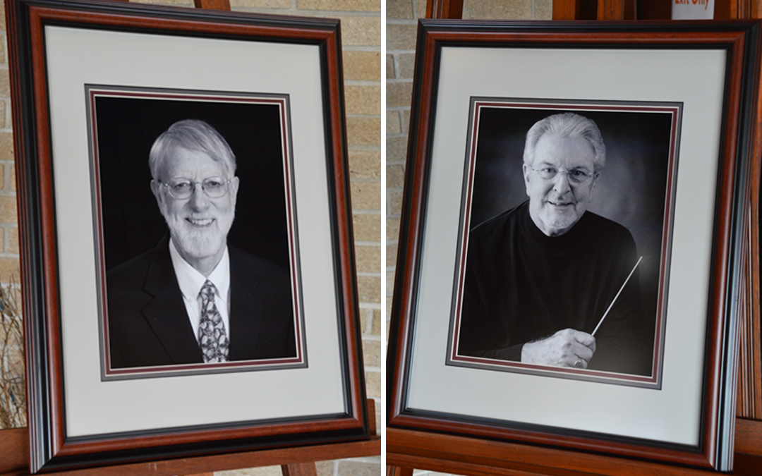 Two picture frames side by side of two men in the Faculty Hall of Fame