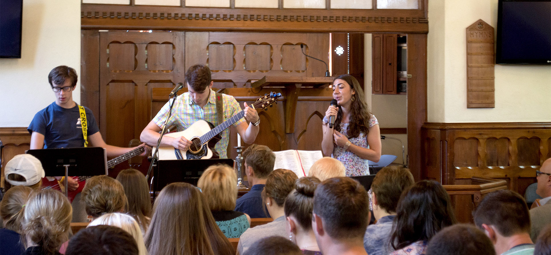 Students singing in Chapel