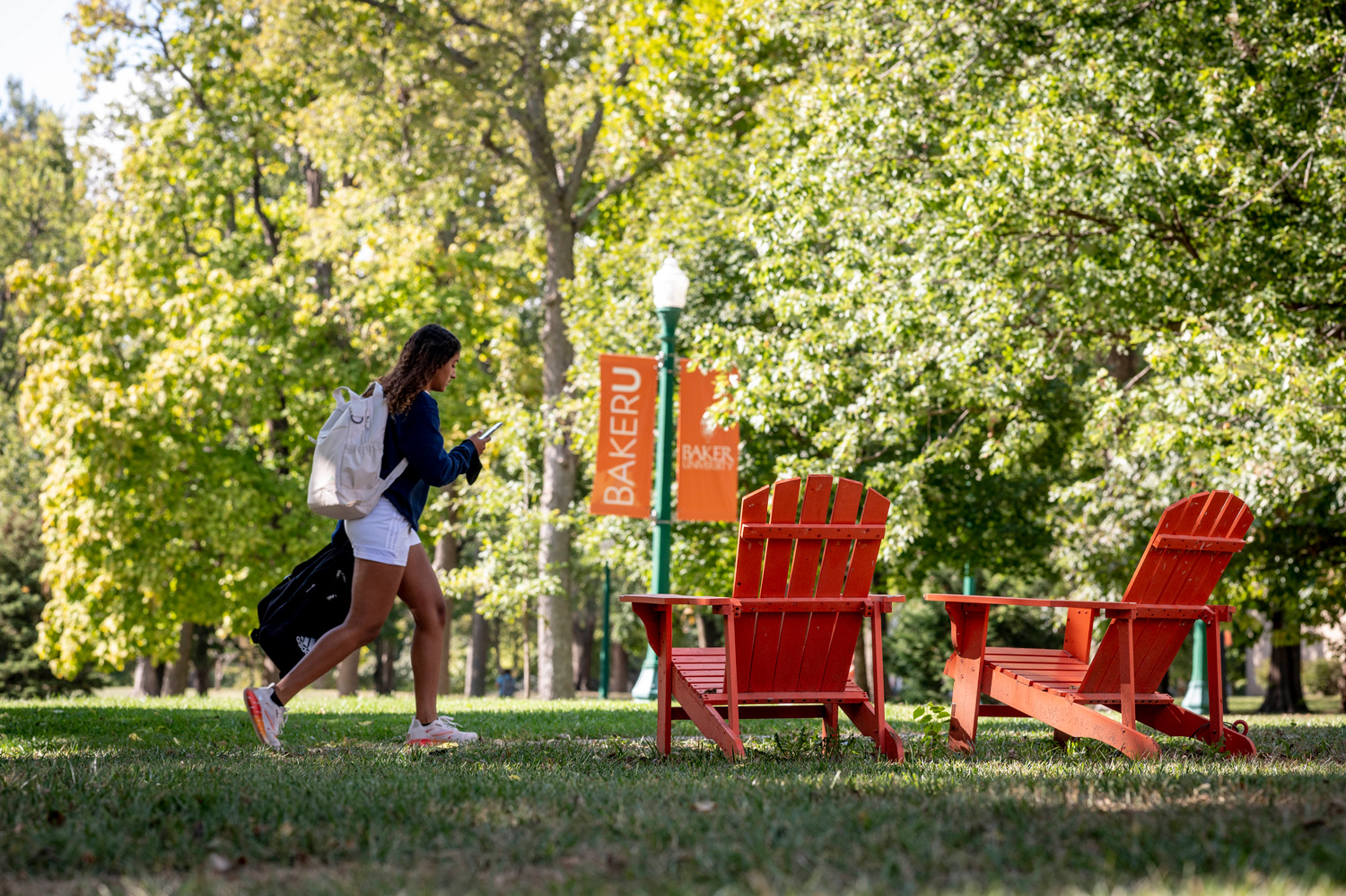 Student walking across campus.