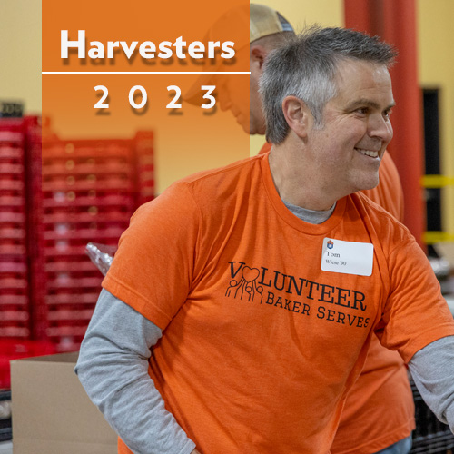 Baker alum volunteering at food bank