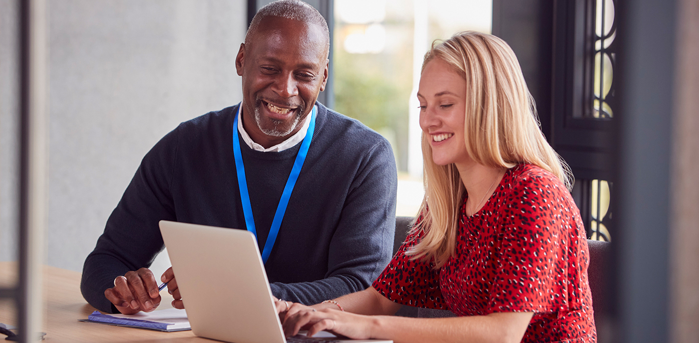 Two adults learning online